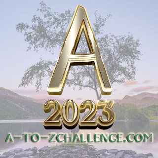 The letter A 2023 A-Z challenge against a background of a tree and hills