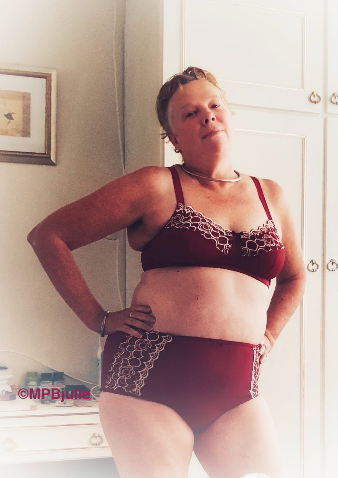 Me wearing a dark red bra and pantie set.