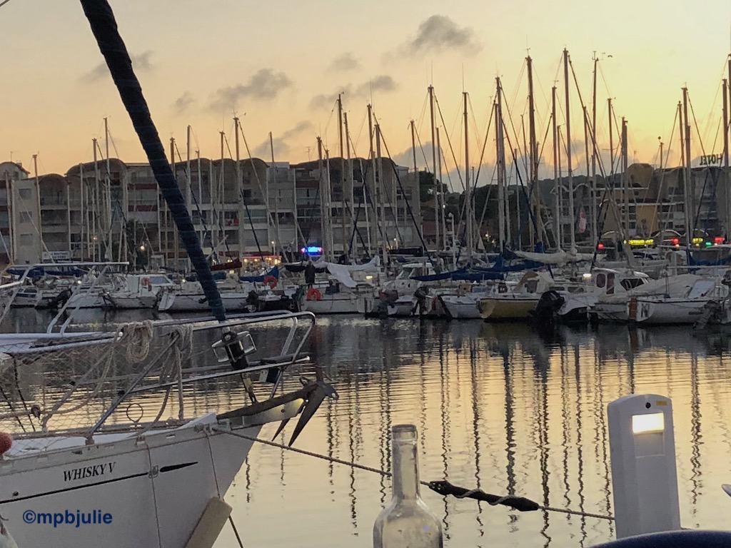 A French harbour at sunset. 